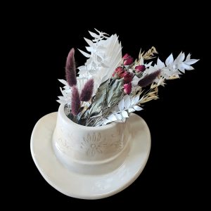 Dried and preserved arrangement created in a cowgirl hat from Linard Floral in Kingaroy