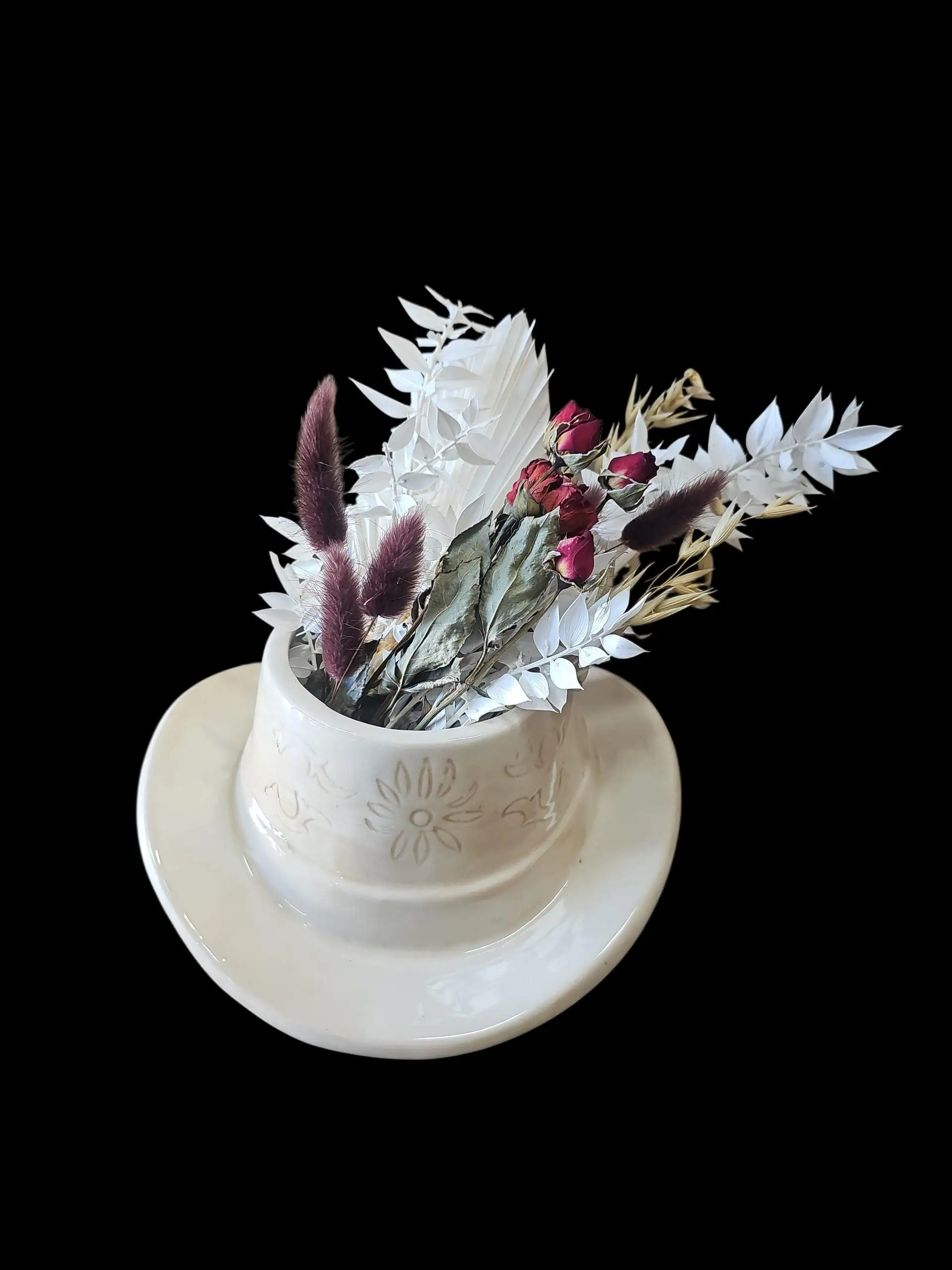 Dried and preserved arrangement created in a cowgirl hat from Linard Floral in Kingaroy