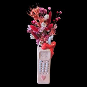 Dried and preserved arrangement created in a phone vase from Linard Floral in Kingaroy